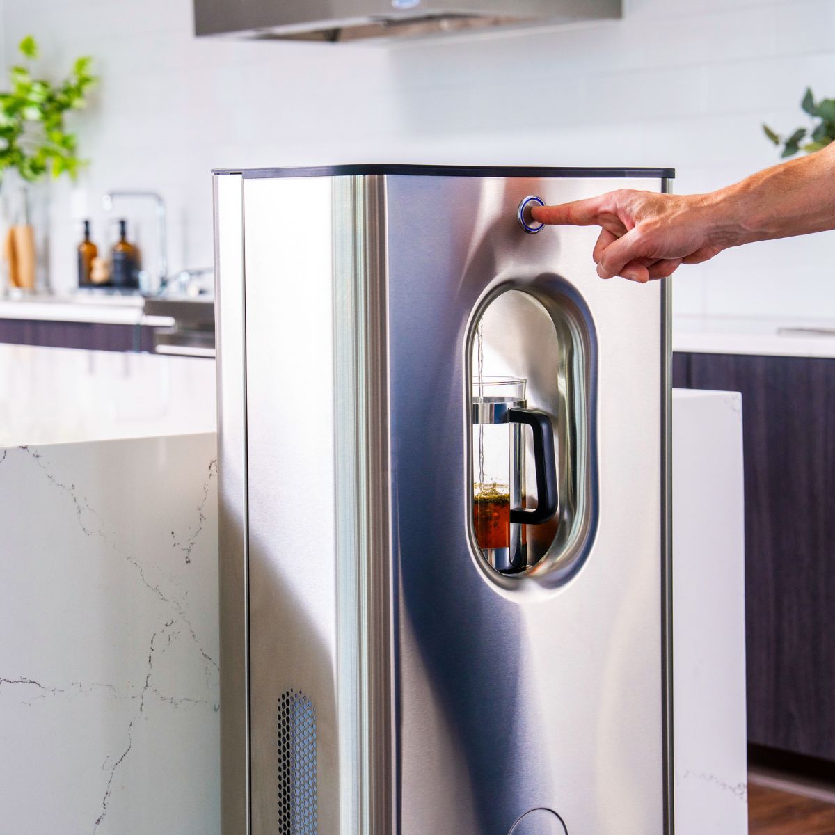 Man pressing Kara Pure 2 dispense button