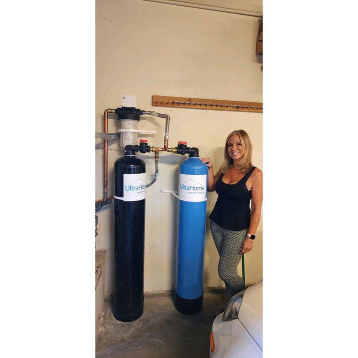 UltraWater UltraHome Premium + Salt-Free Softener Combo - woman holding the system